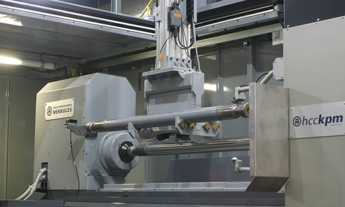 Automated loading and unloading of the grinder